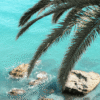 Golden sand and clear Mediterranean water at Playa de Burriana in Nerja, Costa del Sol