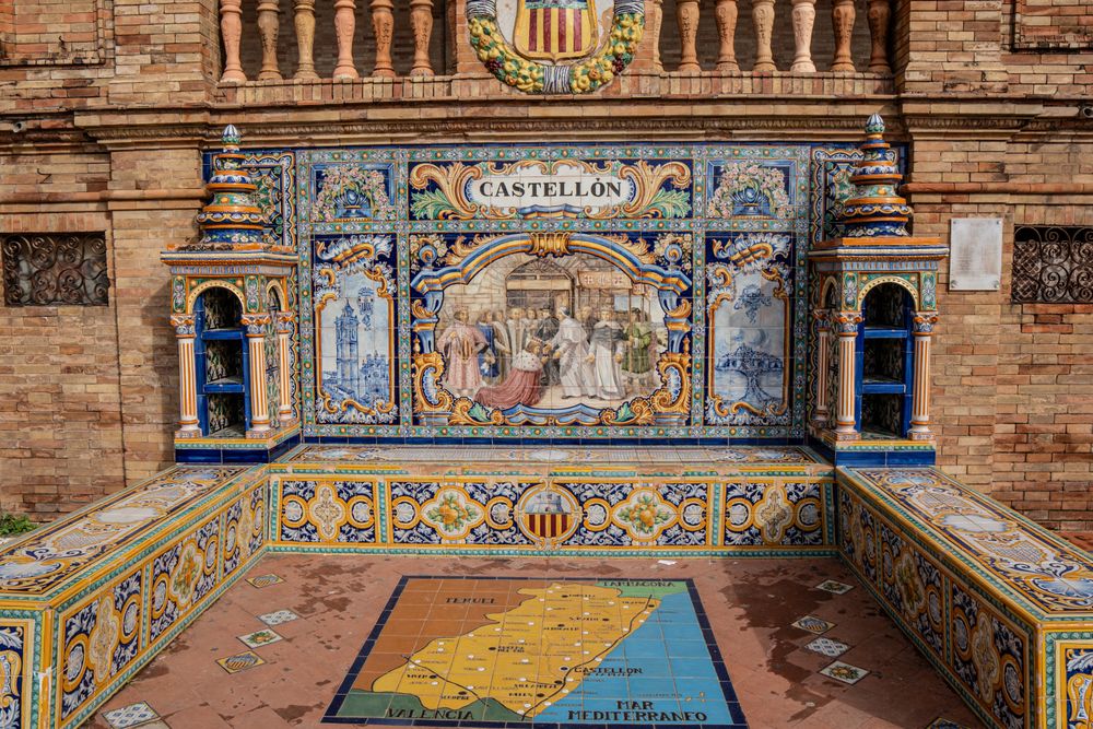 Colorful ceramic provincial alcoves at Plaza de España in Seville, Spain