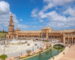Plaza de España Seville canal with bridge, boats and fountain in María Luisa Park 2026
