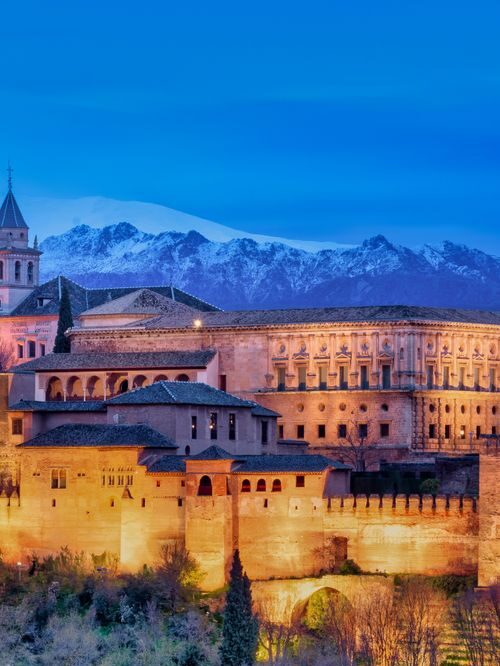 Granada at Night: The Illuminated Alhambra The Alhambra Palace illuminated at night in Granada, Andalusia, Spain