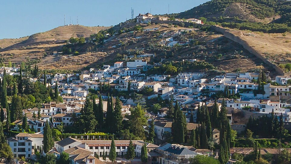 Sacromonte, Granada, Spain Traditional white cave houses in Sacromonte overlooking Granada, Spain.