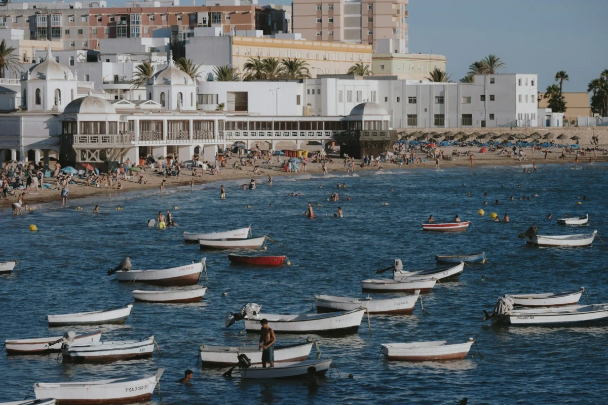 La Caleta Beach in Málaga, Spain La Caleta Beach in Málaga with Mediterranean Sea views and a coastal promenade