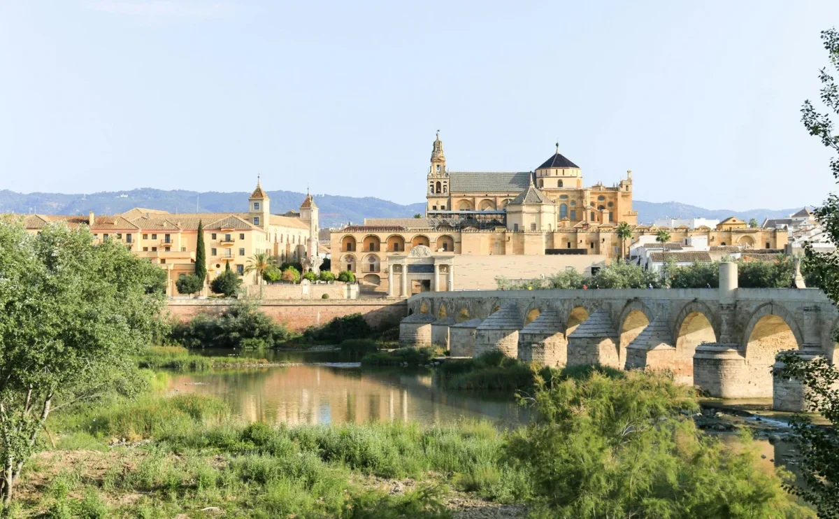 Roman Bridge of Córdoba crossing the Guadalquivir River with the Mosque-Cathedral in the background